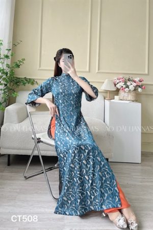 AD suông xanh duong đậm phối cam hoạ tiết lá kiotviet 14cfc15d04ee37b57ae2561a451b7056
