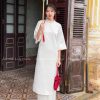 áo dài gam trang kem hoa đào kiotviet 525375c66439de31862c6b6439213c6c
