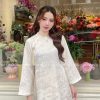 Áo dài gấm họa tiết màu kem sữa kiotviet 686be68660181ec54c453e957287e534