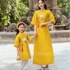 Áo dài bé gái vàng tết _AD gia đình _ tacpa kiotviet e10a9e77eef458b12ca0fdd6c65010f7